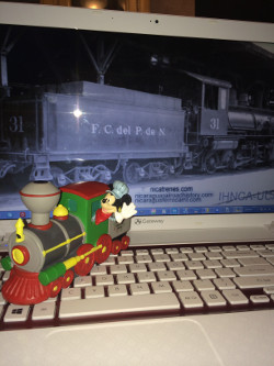 Micky mouse in a steam locomotive with my laptop
